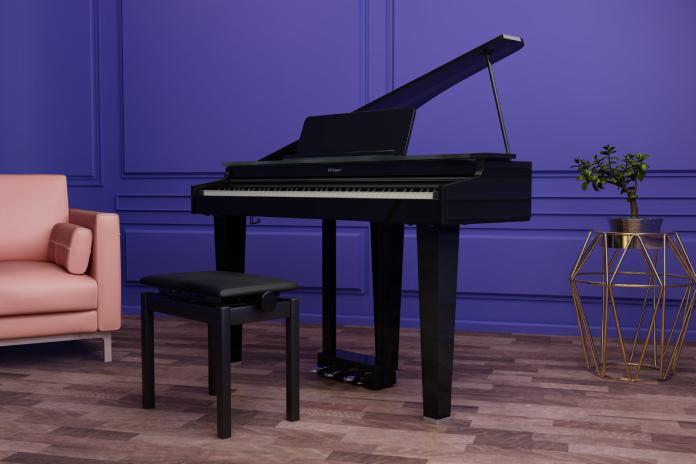Roland GP3 electric grand piano in a living room setting, showcasing its space-saving design